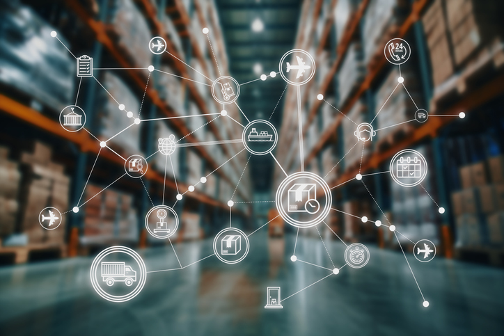 A network of logistics and supply chain icons superimposed over a blurred warehouse, illustrating interconnected systems, transportation, and global distribution.