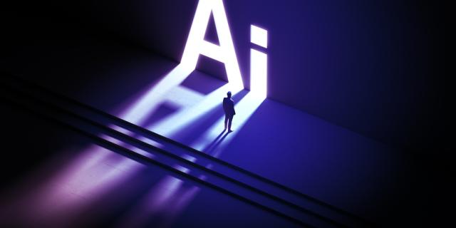 Illustration eines Menschen vor einem Riesenschriftzug "AI"