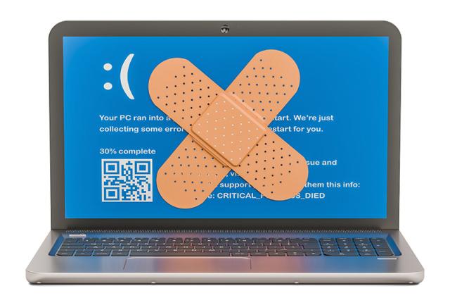 Laptop mit stilisiertem Pflaster am Screen
