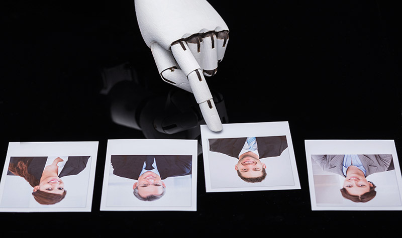 Close-up Of A Robot's Hand Selecting Candidate Photograph